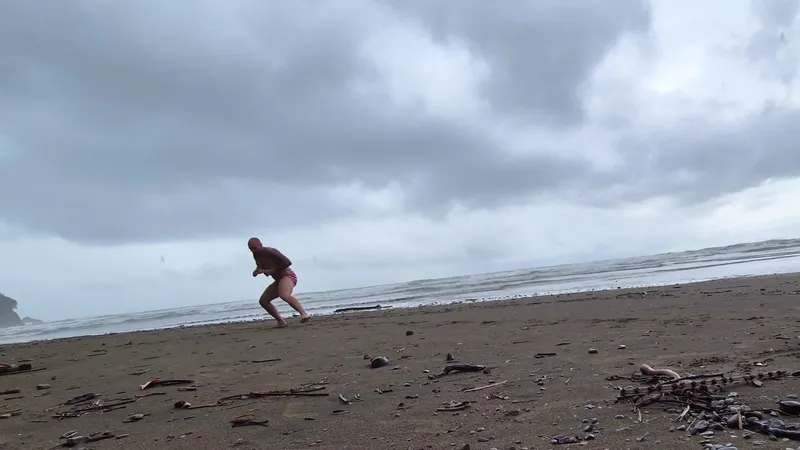 Josh doing a deep lateral shuffle across the sand at Playa Ventanas
